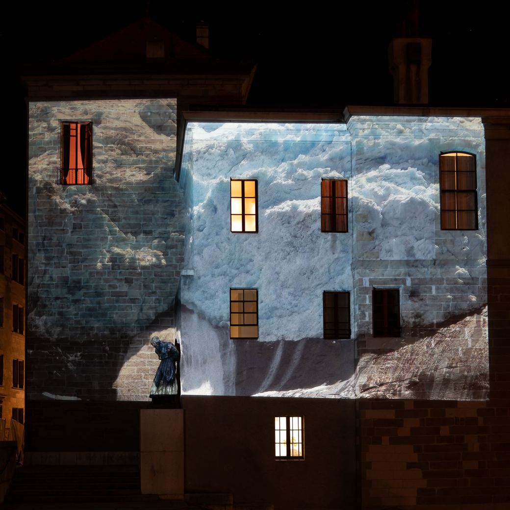A glacier projected across a façade in Geneva during H2O